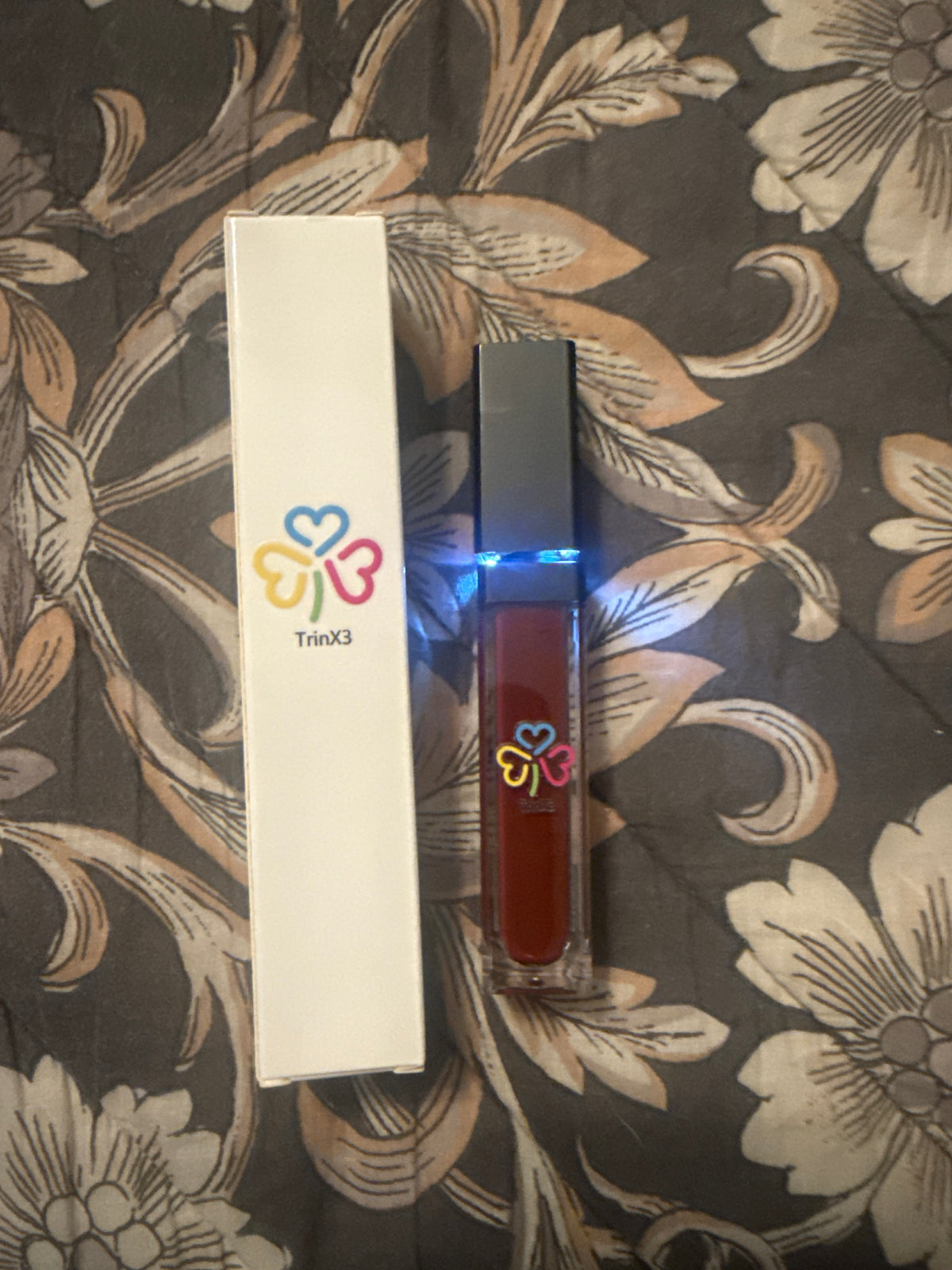 TrinX3 lipgloss with light & mirror